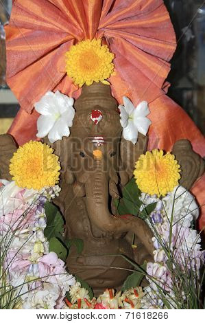 Flower Studded Ganesha Idol