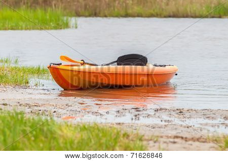 Orange Kayak On Pamlino Sound Beach