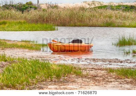 Orange Kayak On Pamlino Sound Beach
