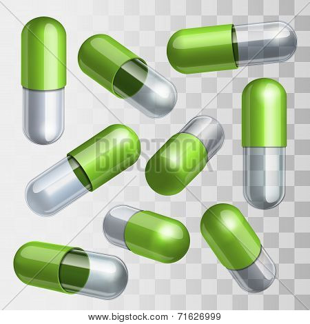 Set of green and transparent medical capsules in different positions