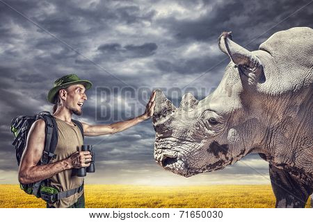 Tourist Touching The Rhino
