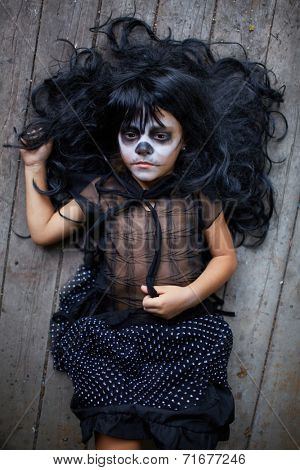 Portrait of Halloween girl with gloomy expression