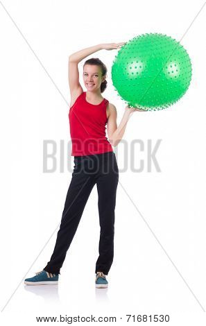 Young woman exercising with swiss ball