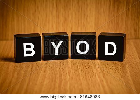 Byod Or Bring Your Own Device Word On Black Block