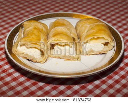 Cottage Cheese Strudel On Checkered Tablecloth