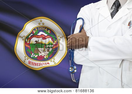 Concept Of National Healthcare System - Minnesota flag on background