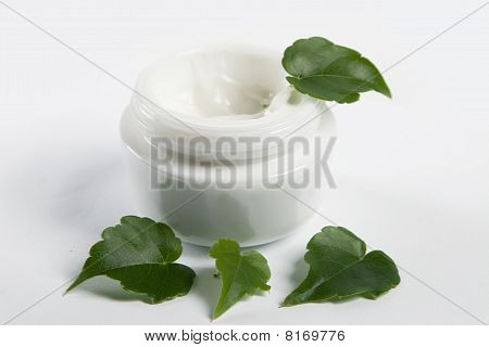 Cosmetic Cream With Green Leaves