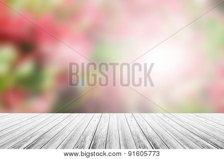 Wood terrace and Abstract blurred nature background