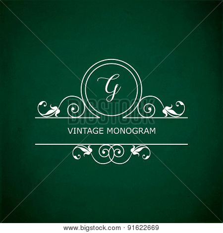 Monogram of the letter G, in retro floral style on green chalkboard background. 