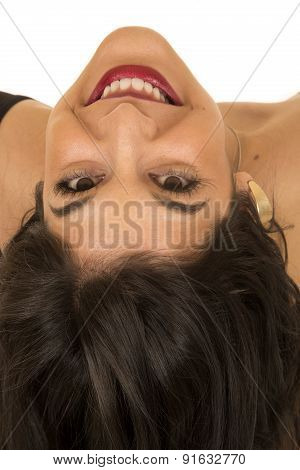 Prortrait Of Updised Down Dark Complected Woman Smiling