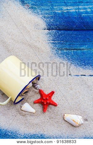 Colorful Shells Cup Sand Strewn Blue Boards