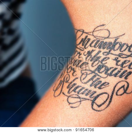 Image Of Tattooed Female Arm. Close-up Portrait Of A Tattooed Young Girl. Text Tattoo