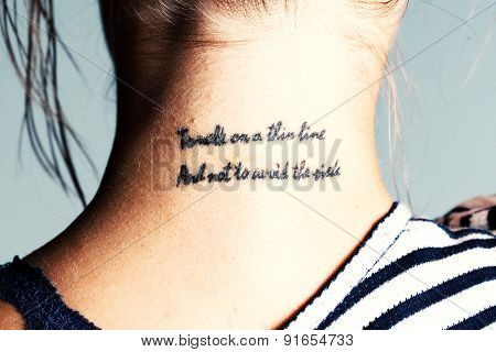 Tattoo. Tattooed Neck. Close-up Portrait Of A Young Girl Wearing Stripped T-shirt, Fashion Shot.