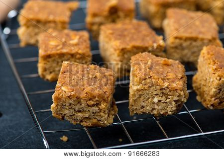 Homemade Healthy Flapjacks With Honey On Cooling Rack