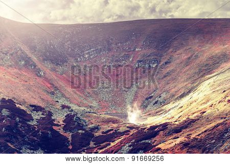 Alpine lake Brebeneckul on summer mountain ravine (Ukraine, Chornogora Ridge, Carpathian Mountains).