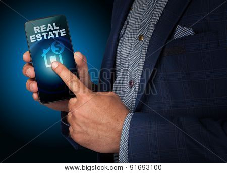 Businessman Presses A Button Touch Screen Real Estate Smatrfona. Business, Technology, Internet And