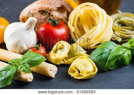 Selection Of Italian Tipical Food On Black Background