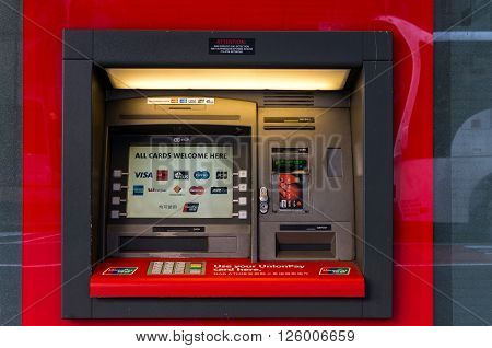 Sydney, Australia - Mar 26, 2016: NAB ATM on on Castlereagh street, Sydney, Australia. NAB is one of the four largest financial institutions in Australia and 21st largest bank in the world