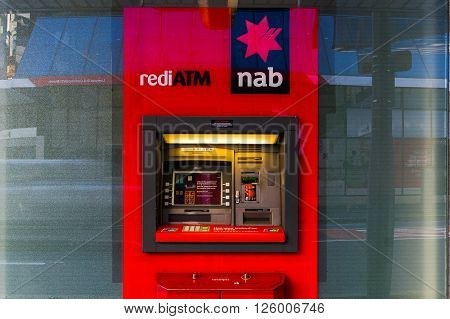 Sydney, Australia - Mar 26, 2016: NAB ATM on on Castlereagh street, Sydney, Australia. NAB is one of the four largest financial institutions in Australia and 21st largest bank in the world