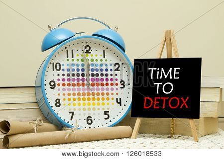 Time to detox concept on small blackboard on easel