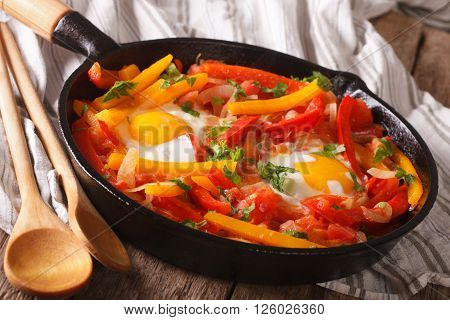 Spanish Food: Pepper With Fried Egg In A Pan Close-up
