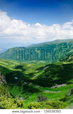 Beautiful blue sky and glade high up in Carpathian mountains