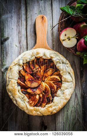 Image of Apple Pie On Rustic Wooden Background