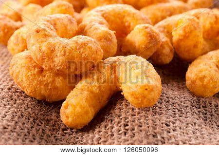 Image of unhealthy snacks with cheese and peanuts