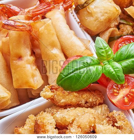 Asian snacks in white bowls. Asian cuisine