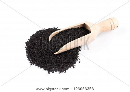 Heap Of Black Sesame On Wooden Spoon