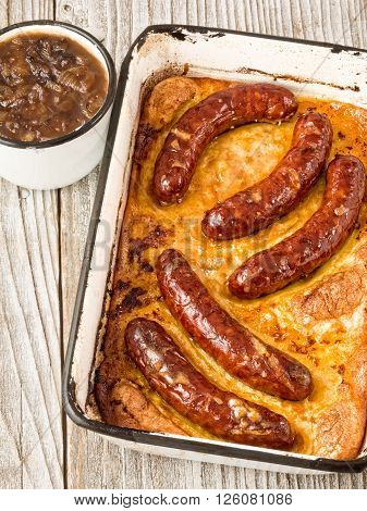 close up of rustic english pub grub toad in the hole