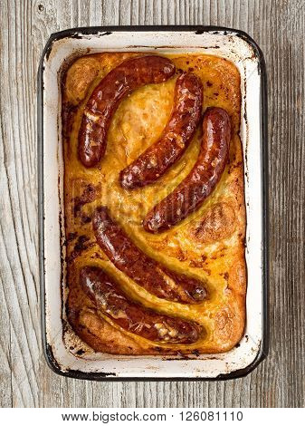 close up of rustic english pub grub toad in the hole