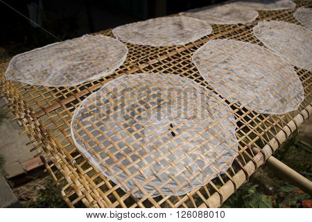 making, drying ricepaper on the bamboo net in vietnam, traditional food
** Note: Soft Focus at 100%, best at smaller sizes