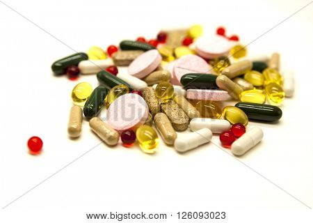 Different pills, medications, the pills  closeup on white background