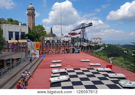 BARCELONA, SPAIN - AUGUST 1, 2015: View of Tibidabo Amusement Park built by the entrepreneur Salvador Andreu and opened in 1899. The park is one of the oldest in the world that is still functioning.