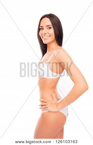 Side View Photo Of Cheerful Smiling Young Woman In White Lingerie