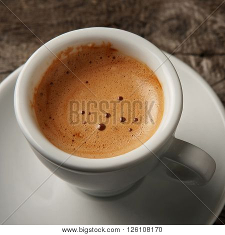 Cup of coffee espresso with foam on top view. Square frame. Coffee background
** Note: Soft Focus at 100%, best at smaller sizes