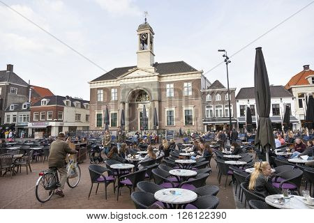 harderwijk, netherlands, 1 april 2016: people enjoy nice spring day on the market of dutch town harderwijk