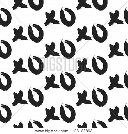 XOXO hugs and kisses bold seamless pattern. Hand drawn trendy hipster black and white XO background. Ink grungy brush texture.