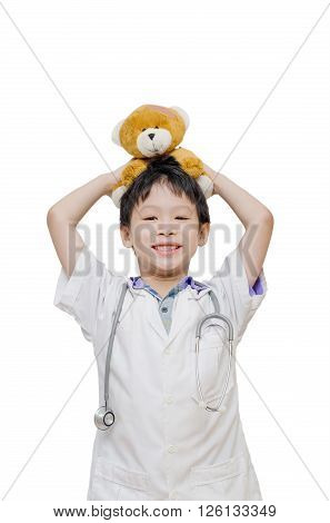 Little Asian boy pretend to be doctor over white background
