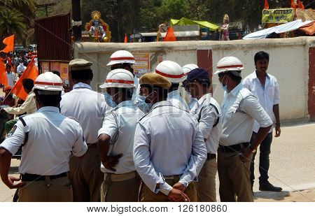 HYDERABAD,INDIA-APRIL 15: Indan Traffic police wait to follow shoba yatra procession of Hindu god Sri rama on navami festival on April 15,2016 in Hyderabad,India