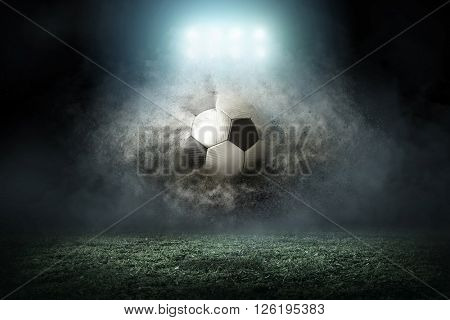 Soccer player with ball in action outdoors