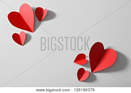 Red paper heart isolated on white background with copy space
