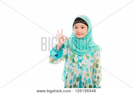 Close up of cute muslim girl on white background isolated.