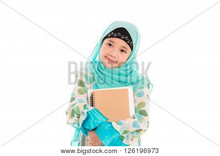 Close up of cute muslim girl on white background isolated.