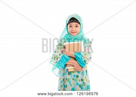Close up of cute muslim girl on white background isolated.
