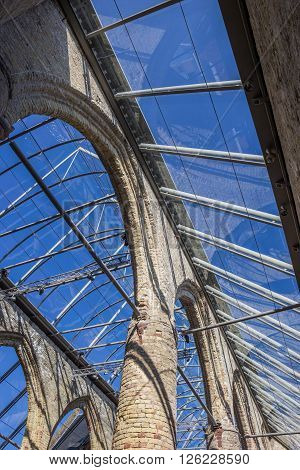 BOLSWARD, NETHERLANDS - APRIL 11, 2016: Ruins of the Broere church with modern glass roof in Bolsward Netherlands