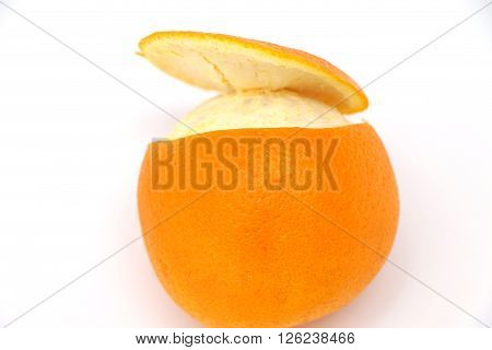 good juicy orange with peel cut in a circle on a white background