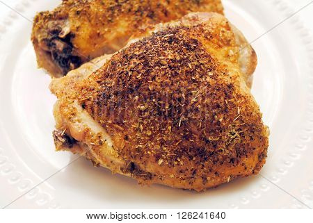 Crispy Oven Roasted Chicken Thighs on a White Plate