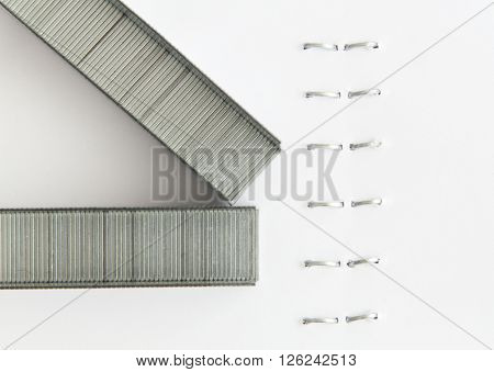 Staples in a stapled paper macro view